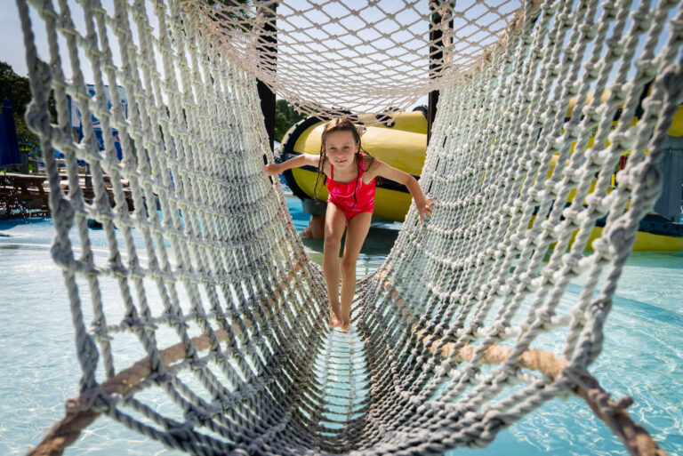 child playing at shipwreck island