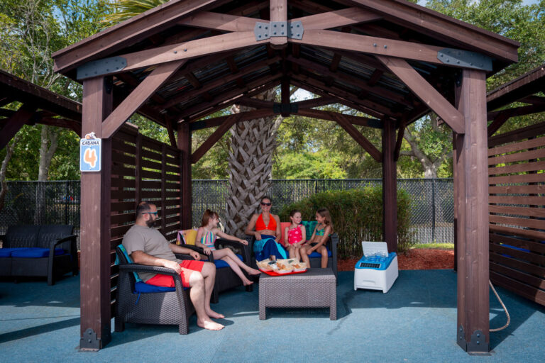 family relax in a cabana